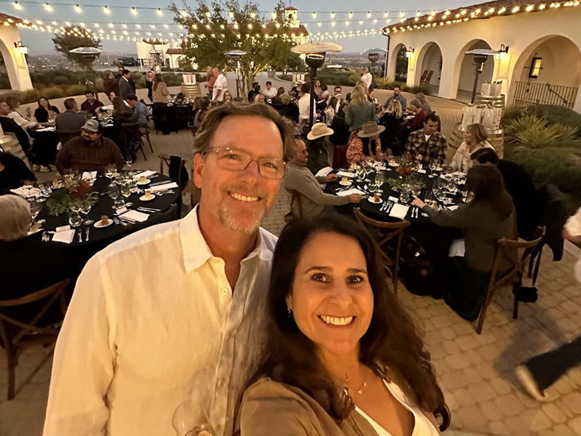Dave and Antonia Carpenter standing in from of the Ciento Cellars courtyard ready to welcome guests for their annual Winemaker Dinner